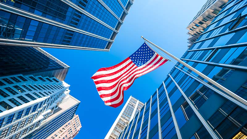 US flag flying in New York City Financial District