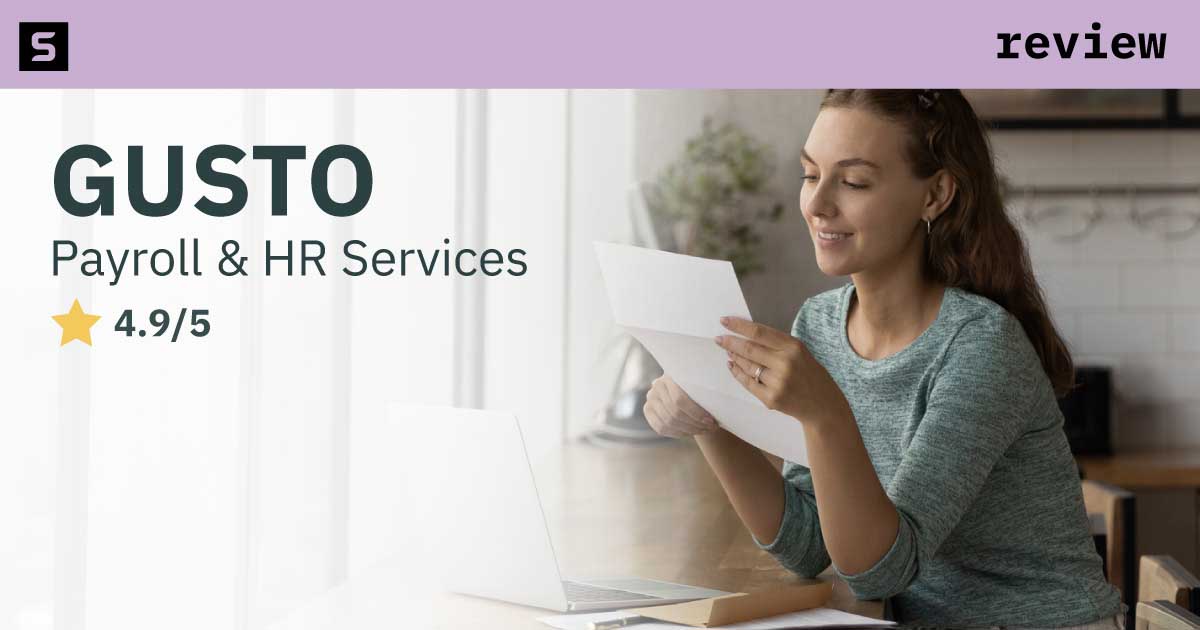 HR employee with tablet, standing next to Gusto review.