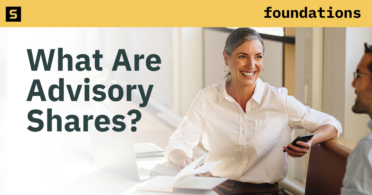 Woman smiling in an office.