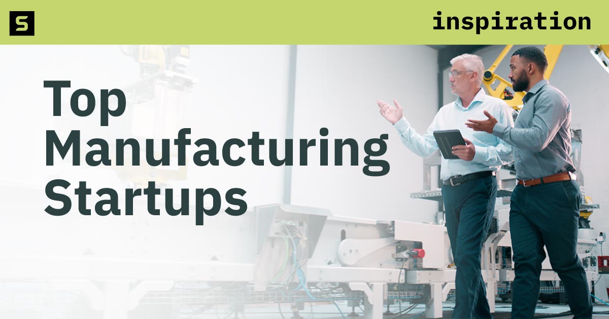 Men touring a manufacturing facility.