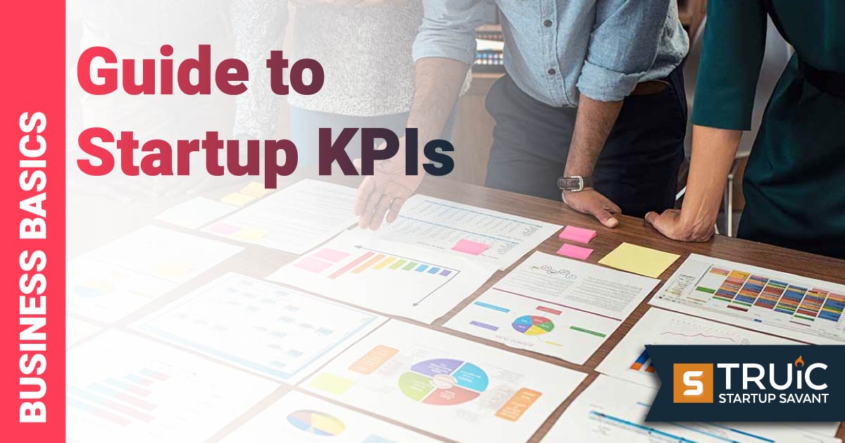 Business team analyzing graphs.