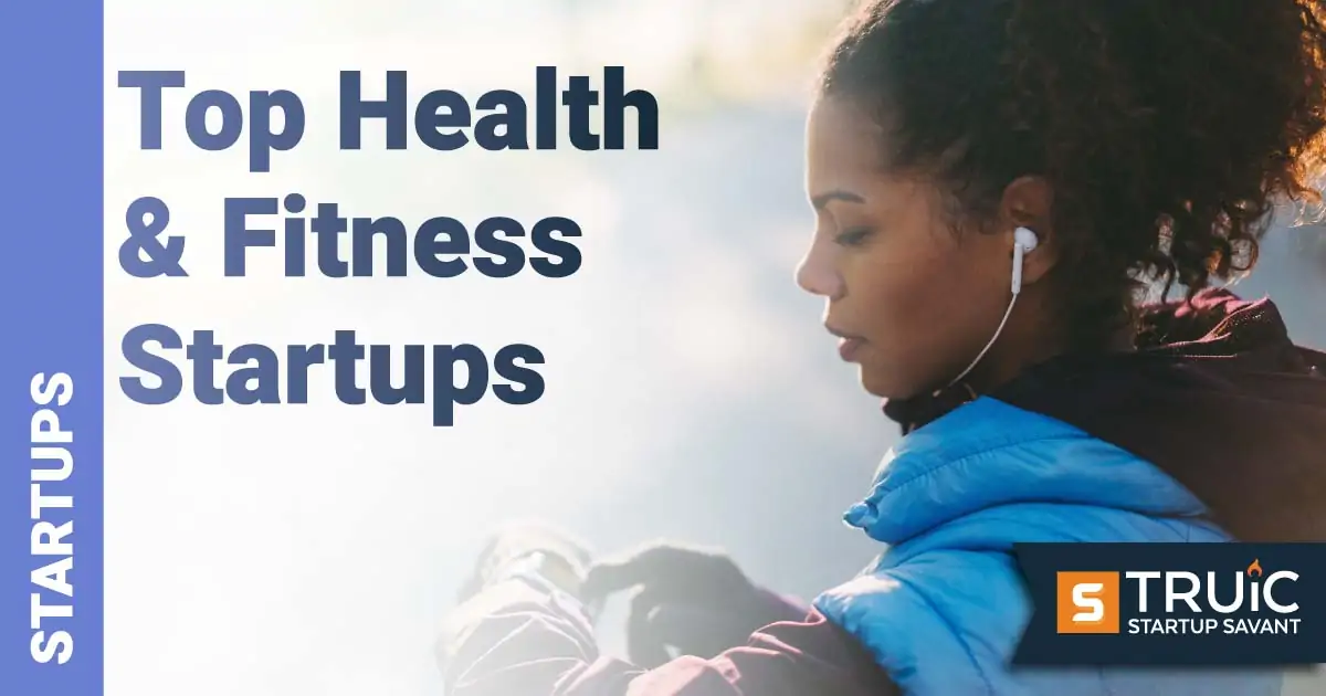 Woman looking at her watch while out for a run.