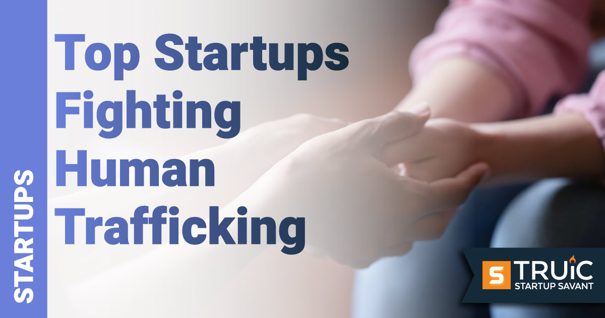 Hands holding palms of a woman.