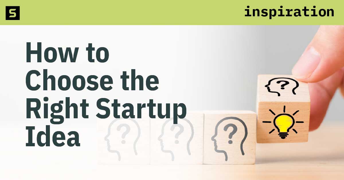 Hand flipping over wooden block with head human symbol and light bulb.